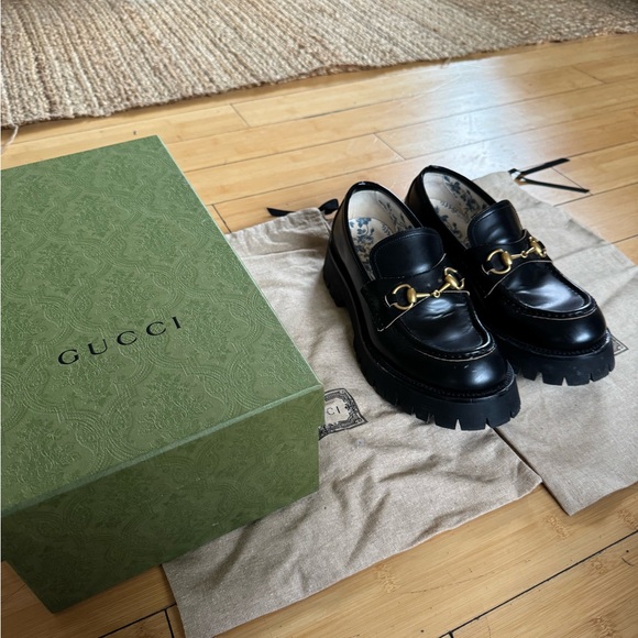 Gucci Black Leather Loafers with Gold Accents - Picture 2 of 7